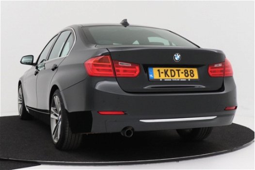 BMW 3-serie - 320i EfficientDynamics Edition Upgrade Edition | LEER | Sportstoelen | Xenon | Navigat - 1