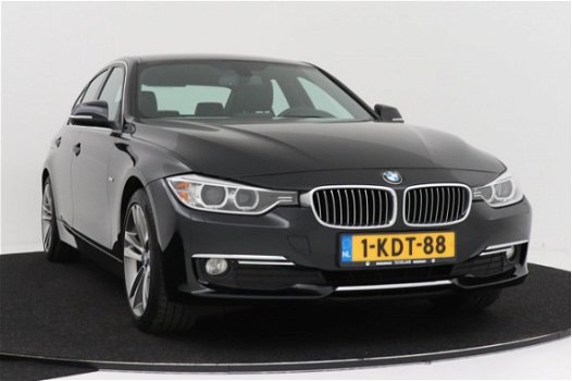 BMW 3-serie - 320i EfficientDynamics Edition Upgrade Edition | LEER | Sportstoelen | Xenon | Navigat - 1