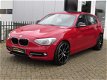 BMW 1-serie - 116i Sport NAVIGATIE PROF|XENON|SCHUIFDAK|PDC|19 INCH M-VELGEN| - 1 - Thumbnail