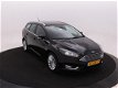 Ford Focus Wagon - 1.0 125pk Titanium | Voorruitverwarming | Navi | PDC | - 1 - Thumbnail