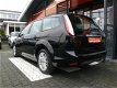 Ford Focus Wagon - 2.0 Ghia Automaat Navi Climate Cruise Ctr Stoelverwarming Pdc Achter Alcantara Ap - 1 - Thumbnail