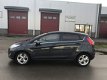 Ford Fiesta - 1.25 Titanium 5-Deurs 82 PK. Clima, CPV, Elektr.ramen, LMvelgen, Radio-CD, Enz... Mooi - 1 - Thumbnail