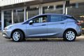 Opel Astra - 1.0 Turbo Edition HB ✅NAP| NAVI900 met DAB| PDC v+a| Airco| Cruise| Trekhaak| Orig.NL| - 1 - Thumbnail