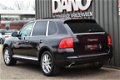 Porsche Cayenne - 4.5 S 340 PK 2005 Zwart 159.778 km/Youngtimer/Xenon/Navi/Leer - 1 - Thumbnail