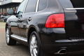 Porsche Cayenne - 4.5 S 340 PK 2005 Zwart 159.778 km/Youngtimer/Xenon/Navi/Leer - 1 - Thumbnail