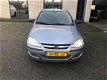 Opel Corsa - 1.2-16V Rhythm 1jaar apk/AIRCO/ NAP/ elek ramen/meeneemprijs - 1 - Thumbnail