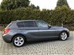 BMW 1-serie - 116i EDE Upgrade Edition NAVI, PDC, CRUISE, LEDER, XENON, ENZ - 1 - Thumbnail