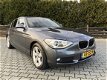 BMW 1-serie - 116i EDE Upgrade Edition NAVI, PDC, CRUISE, LEDER, XENON, ENZ - 1 - Thumbnail