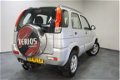 Daihatsu Terios - 1.3 4WD SXE - 1 - Thumbnail