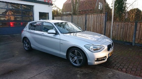 BMW 1-serie - 116i EDE Executive Rijklaarprijs - 1