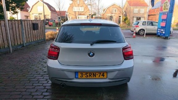 BMW 1-serie - 116i EDE Executive Rijklaarprijs - 1