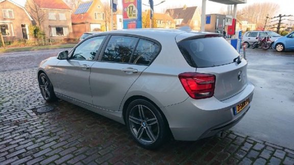 BMW 1-serie - 116i EDE Executive Rijklaarprijs - 1