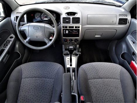 Kia Rio - 1.5 LS _Navi_Airco_Autom_Schuifdak_PDC_NAP - 1