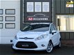 Ford Fiesta - 1.25 Titanium 82pk, 5 Drs, Clima, Stoel en Voorruitverwarming - 1 - Thumbnail