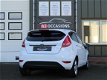 Ford Fiesta - 1.25 Titanium 82pk, 5 Drs, Clima, Stoel en Voorruitverwarming - 1 - Thumbnail