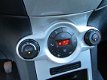 Ford Fiesta - 1.25 Titanium 82pk, 5 Drs, Clima, Stoel en Voorruitverwarming - 1 - Thumbnail