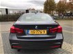 BMW 3-serie - 318i M Sport Automaat 8-Traps Xenon-LED NAV LEDER - 1 - Thumbnail