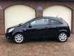 Opel Corsa - 1.4i 16V Color Edition Airco Cruise LMV - 1 - Thumbnail