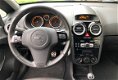 Opel Corsa - 1.4i 16V Color Edition Airco Cruise LMV - 1 - Thumbnail