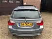 BMW 3-serie Touring - 320i Executive Automaat Full Leder Groot navi Panorma Dak PDC V+A - 1 - Thumbnail