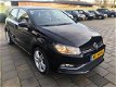 Volkswagen Polo - 1.2 TSI Comfortline (Airco Cruise Facelift) 2014 - 1 - Thumbnail