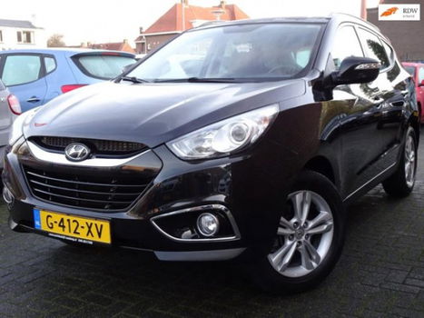 Hyundai ix35 - 2.0i 4WD i-Catcher Uniek / Navi / PDC / Cruise control / keyless Entry / Panoramadak - 1