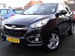 Hyundai ix35 - 2.0i 4WD i-Catcher Uniek / Navi / PDC / Cruise control / keyless Entry / Panoramadak - 1 - Thumbnail