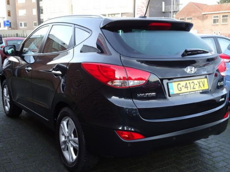 Hyundai ix35 - 2.0i 4WD i-Catcher Uniek / Navi / PDC / Cruise control / keyless Entry / Panoramadak - 1