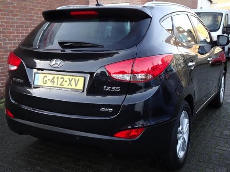 Hyundai ix35 - 2.0i 4WD i-Catcher Uniek / Navi / PDC / Cruise control / keyless Entry / Panoramadak - 1