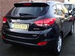 Hyundai ix35 - 2.0i 4WD i-Catcher Uniek / Navi / PDC / Cruise control / keyless Entry / Panoramadak - 1 - Thumbnail