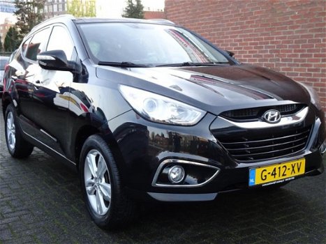 Hyundai ix35 - 2.0i 4WD i-Catcher Uniek / Navi / PDC / Cruise control / keyless Entry / Panoramadak - 1