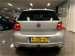 Volkswagen Polo - 1.2 TSI R-Line Edition Automaat * Panoramadak / 1e Eig / NL auto / Navigatie - 1 - Thumbnail