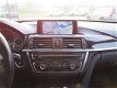 BMW 3-serie - 320i EDE Upgrade Edition - NL AUTO - 1 EIGENAAR - NAVI - LEER - PDC - CLIMA - CRUISE - 1 - Thumbnail