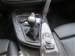 BMW 3-serie - 320i EDE Upgrade Edition - NL AUTO - 1 EIGENAAR - NAVI - LEER - PDC - CLIMA - CRUISE - 1 - Thumbnail