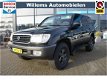 Toyota Land Cruiser 100 - 4.2 VX Standard Roof Window Van PDC, Navigatie & Airco - 1 - Thumbnail