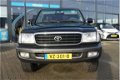 Toyota Land Cruiser 100 - 4.2 VX Standard Roof Window Van PDC, Navigatie & Airco - 1 - Thumbnail