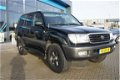 Toyota Land Cruiser 100 - 4.2 VX Standard Roof Window Van PDC, Navigatie & Airco - 1 - Thumbnail