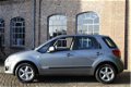Suzuki SX4 - 1.6 Exclusive Auto Airco, Keyless, Trekhaak, LMV. Org. NL - 1 - Thumbnail