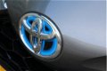 Toyota Yaris - 1.5 Hybrid Bi-Tone Plus Navi 4 seizoenen banden - 1 - Thumbnail