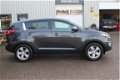 Kia Sportage - 1.6 GDI ISG X-ecutive Plus Pack Trekhaak Allseason banden Volleder Clima Cruise Led d - 1 - Thumbnail