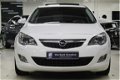 Opel Astra - 1.4 Turbo Ecotec 140pk SPORT / NAVIGATIE / XENON / SCHUIFDAK / 19