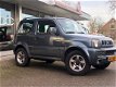 Suzuki Jimny - 1.3 Exclusive 4X4 Dealeronderhouden - 1 - Thumbnail