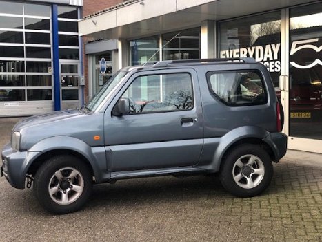 Suzuki Jimny - 1.3 Exclusive 4X4 Dealeronderhouden - 1