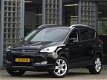 Ford Kuga - 1.5 TITANIUM PLUS / LEER / TREKHAAK - 1 - Thumbnail