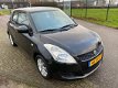 Suzuki Swift - 1.2 Comfort EASSS / Stoelverwarming / Airco / 5 deurs / Multifunctioneel stuurwiel - 1 - Thumbnail