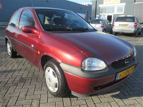 Opel Corsa - 1.2i-16V Strada - 1