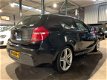 BMW 1-serie - 116i Executive M Pakket/NL Auto/zwarte hemel - 1 - Thumbnail