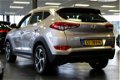 Hyundai Tucson - 1.6 GDi Comfort navi-19-inch velgen-DAB-lane assist-cruise controle-private glas-pa - 1 - Thumbnail