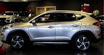 Hyundai Tucson - 1.6 GDi Comfort navi-19-inch velgen-DAB-lane assist-cruise controle-private glas-pa - 1 - Thumbnail