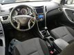 Hyundai i30 - 1.6 GDI Business Edition | Navigatie | Cruise control | Climate control | Parkeersenso - 1 - Thumbnail